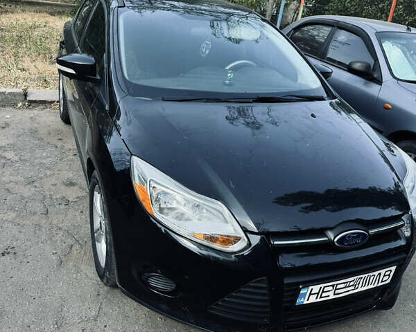 Черный Форд Фокус, объемом двигателя 2 л и пробегом 100 тыс. км за 7600 $, фото 1 на Automoto.ua