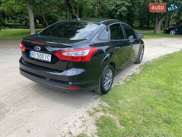 Черный Форд Фокус, объемом двигателя 2 л и пробегом 222 тыс. км за 8700 $, фото 7 на Automoto.ua