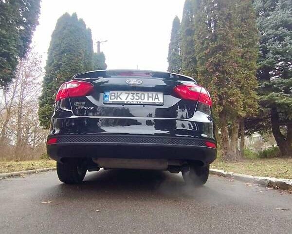 Черный Форд Фокус, объемом двигателя 2 л и пробегом 154 тыс. км за 7800 $, фото 13 на Automoto.ua
