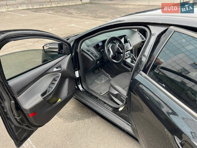 Черный Форд Фокус, объемом двигателя 2 л и пробегом 300 тыс. км за 7500 $, фото 32 на Automoto.ua