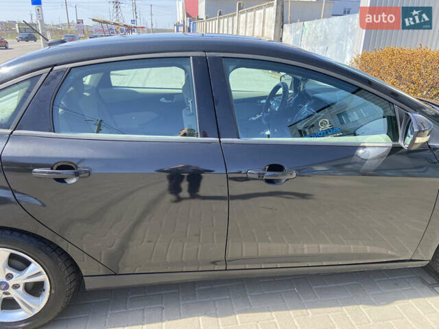 Чорний Форд Фокус, об'ємом двигуна 2 л та пробігом 130 тис. км за 7100 $, фото 7 на Automoto.ua
