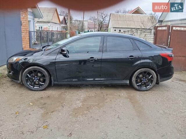 Чорний Форд Фокус, об'ємом двигуна 2 л та пробігом 230 тис. км за 7500 $, фото 28 на Automoto.ua