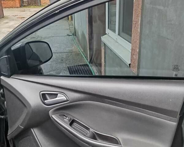 Чорний Форд Фокус, об'ємом двигуна 2 л та пробігом 230 тис. км за 7500 $, фото 23 на Automoto.ua