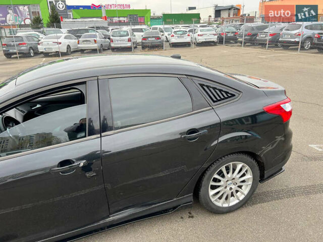 Черный Форд Фокус, объемом двигателя 2 л и пробегом 300 тыс. км за 7500 $, фото 10 на Automoto.ua