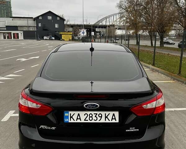Черный Форд Фокус, объемом двигателя 2 л и пробегом 215 тыс. км за 8500 $, фото 2 на Automoto.ua