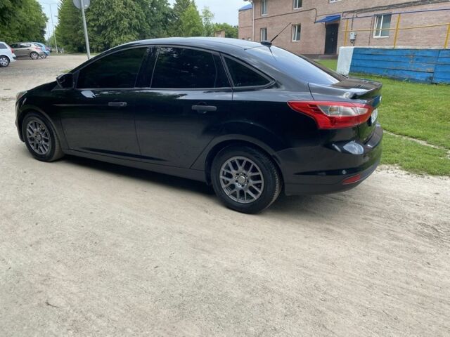 Чорний Форд Фокус, об'ємом двигуна 2 л та пробігом 215 тис. км за 5950 $, фото 6 на Automoto.ua