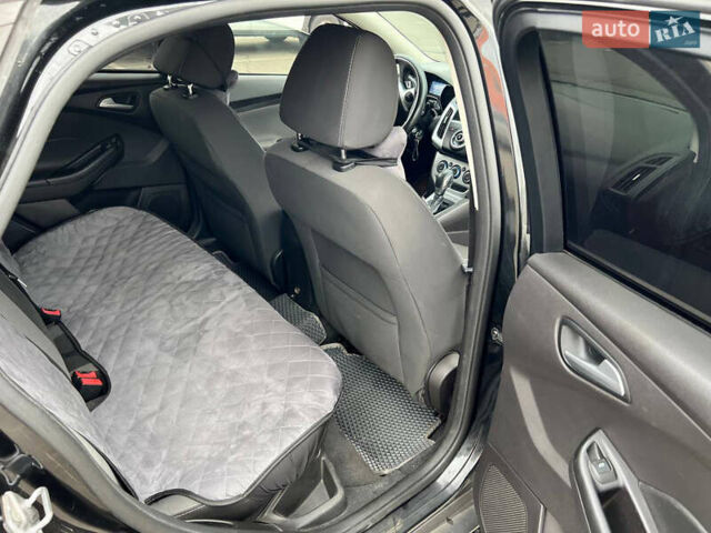 Черный Форд Фокус, объемом двигателя 2 л и пробегом 300 тыс. км за 7500 $, фото 29 на Automoto.ua