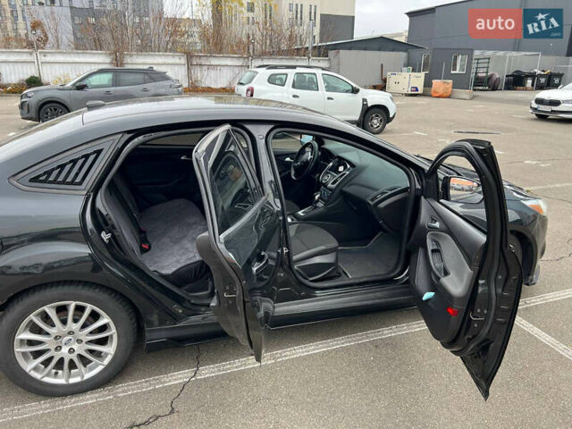 Черный Форд Фокус, объемом двигателя 2 л и пробегом 300 тыс. км за 7500 $, фото 28 на Automoto.ua