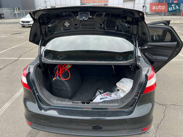 Черный Форд Фокус, объемом двигателя 2 л и пробегом 300 тыс. км за 7500 $, фото 23 на Automoto.ua