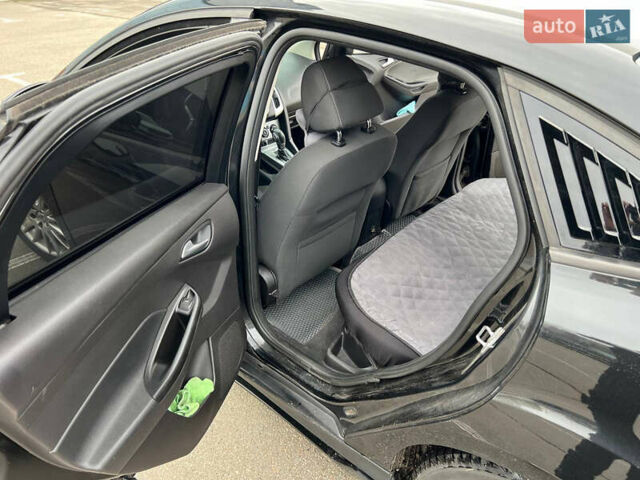 Черный Форд Фокус, объемом двигателя 2 л и пробегом 300 тыс. км за 7500 $, фото 27 на Automoto.ua