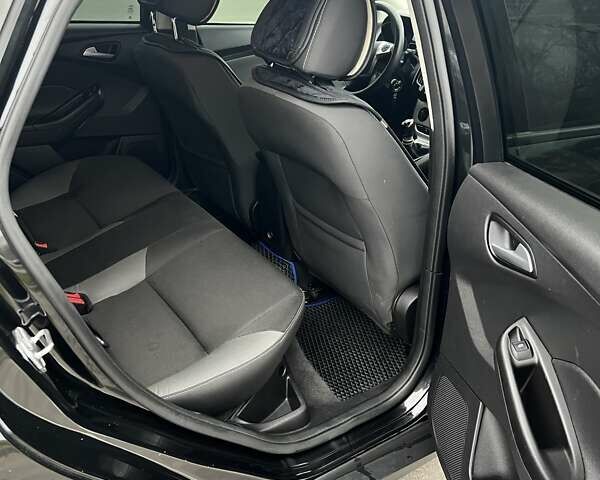 Черный Форд Фокус, объемом двигателя 2 л и пробегом 215 тыс. км за 8500 $, фото 10 на Automoto.ua