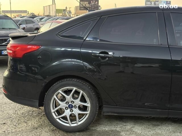 Черный Форд Фокус, объемом двигателя 2 л и пробегом 161 тыс. км за 8590 $, фото 14 на Automoto.ua