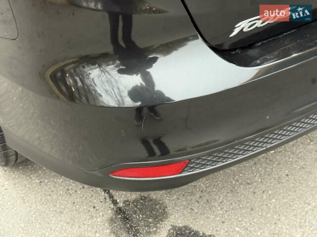 Черный Форд Фокус, объемом двигателя 2.02 л и пробегом 206 тыс. км за 6699 $, фото 23 на Automoto.ua