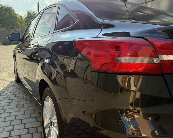 Чорний Форд Фокус, об'ємом двигуна 2 л та пробігом 183 тис. км за 8250 $, фото 13 на Automoto.ua