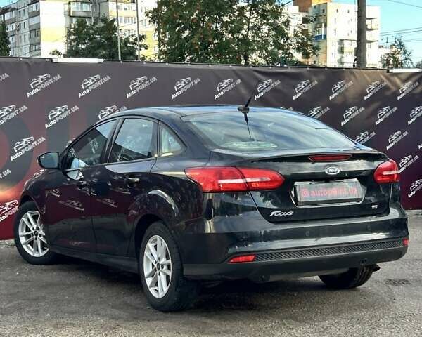 Чорний Форд Фокус, об'ємом двигуна 2 л та пробігом 156 тис. км за 8300 $, фото 7 на Automoto.ua