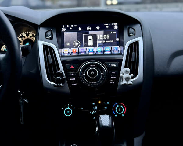 Форд Фокус 2015 в Виннице на Automoto.ua Черный Форд Фокус, объемом двигателя 2 л и пробегом 275 тыс. км за 6999 $, фото 44 на Automoto.ua