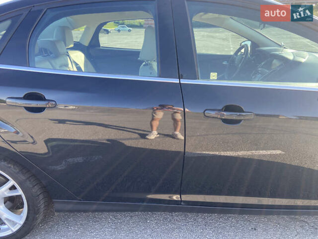 Чорний Форд Фокус, об'ємом двигуна 2 л та пробігом 109 тис. км за 7500 $, фото 2 на Automoto.ua