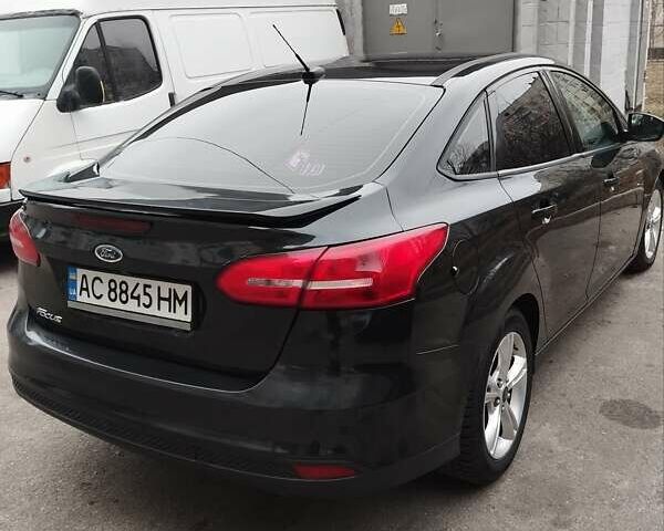 Чорний Форд Фокус, об'ємом двигуна 2 л та пробігом 163 тис. км за 8100 $, фото 2 на Automoto.ua