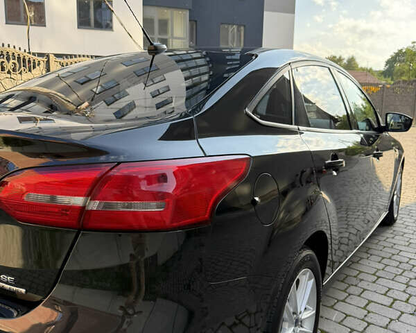 Чорний Форд Фокус, об'ємом двигуна 2 л та пробігом 183 тис. км за 8250 $, фото 19 на Automoto.ua