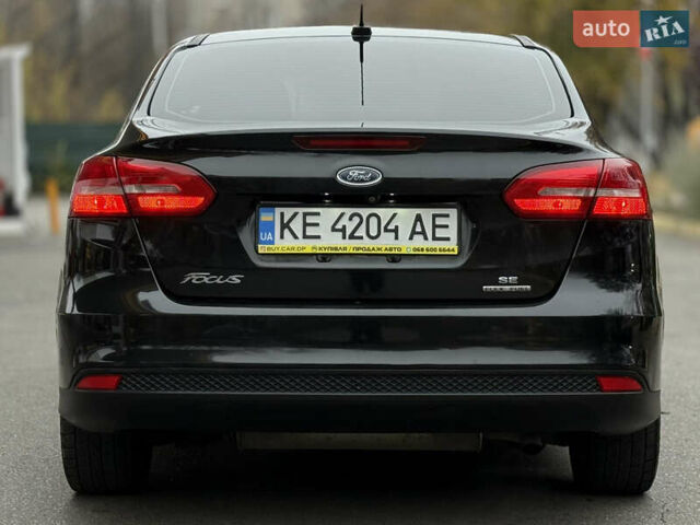 Черный Форд Фокус, объемом двигателя 2.02 л и пробегом 206 тыс. км за 6699 $, фото 3 на Automoto.ua