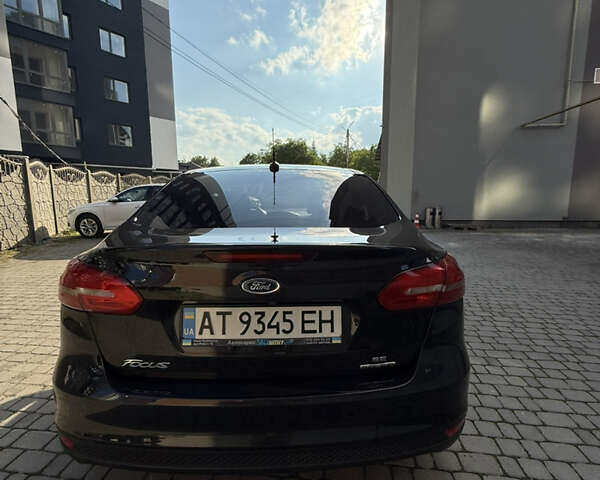 Чорний Форд Фокус, об'ємом двигуна 2 л та пробігом 183 тис. км за 8250 $, фото 1 на Automoto.ua