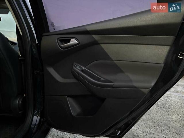 Черный Форд Фокус, объемом двигателя 2 л и пробегом 161 тыс. км за 8590 $, фото 28 на Automoto.ua