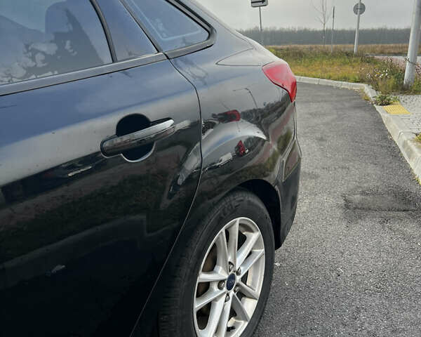 Черный Форд Фокус, объемом двигателя 2 л и пробегом 203 тыс. км за 7200 $, фото 9 на Automoto.ua