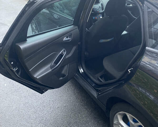 Черный Форд Фокус, объемом двигателя 2 л и пробегом 147 тыс. км за 7899 $, фото 24 на Automoto.ua