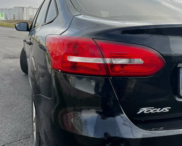 Черный Форд Фокус, объемом двигателя 2 л и пробегом 203 тыс. км за 7200 $, фото 5 на Automoto.ua