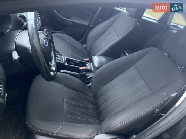 Черный Форд Фокус, объемом двигателя 2 л и пробегом 147 тыс. км за 7899 $, фото 28 на Automoto.ua