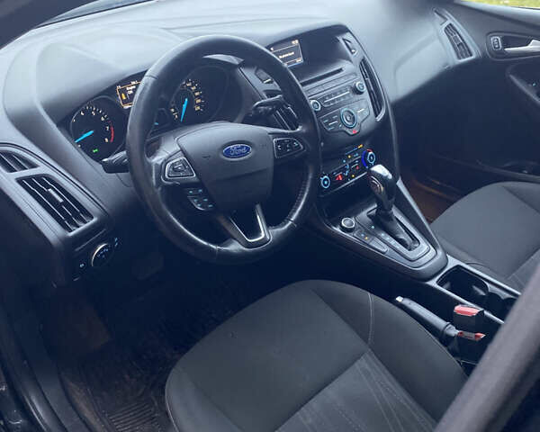 Черный Форд Фокус, объемом двигателя 2 л и пробегом 147 тыс. км за 7899 $, фото 27 на Automoto.ua