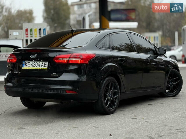 Черный Форд Фокус, объемом двигателя 2.02 л и пробегом 206 тыс. км за 6699 $, фото 4 на Automoto.ua