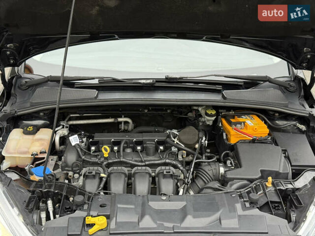 Черный Форд Фокус, объемом двигателя 2.02 л и пробегом 206 тыс. км за 6699 $, фото 11 на Automoto.ua