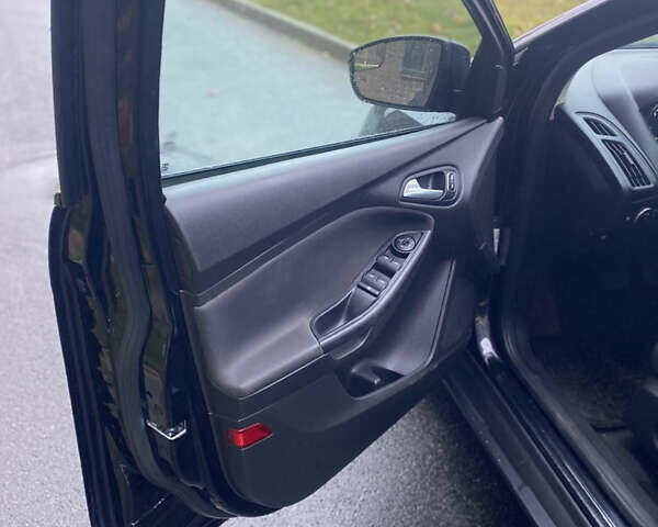 Черный Форд Фокус, объемом двигателя 2 л и пробегом 147 тыс. км за 7899 $, фото 26 на Automoto.ua