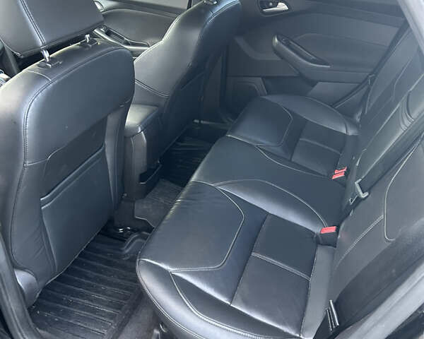 Чорний Форд Фокус, об'ємом двигуна 2 л та пробігом 143 тис. км за 7400 $, фото 4 на Automoto.ua