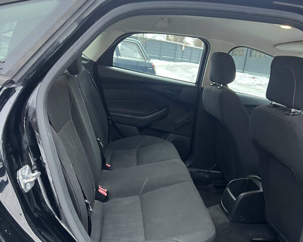 Черный Форд Фокус, объемом двигателя 2.01 л и пробегом 80 тыс. км за 6900 $, фото 14 на Automoto.ua