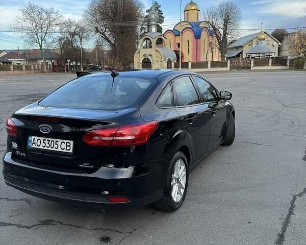 Черный Форд Фокус, объемом двигателя 2 л и пробегом 165 тыс. км за 7800 $, фото 1 на Automoto.ua