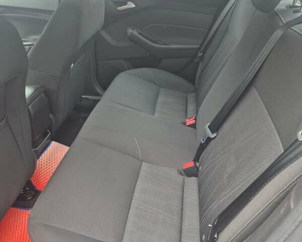 Черный Форд Фокус, объемом двигателя 2 л и пробегом 116 тыс. км за 7700 $, фото 9 на Automoto.ua