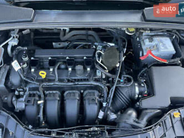 Чорний Форд Фокус, об'ємом двигуна 2 л та пробігом 220 тис. км за 6999 $, фото 7 на Automoto.ua