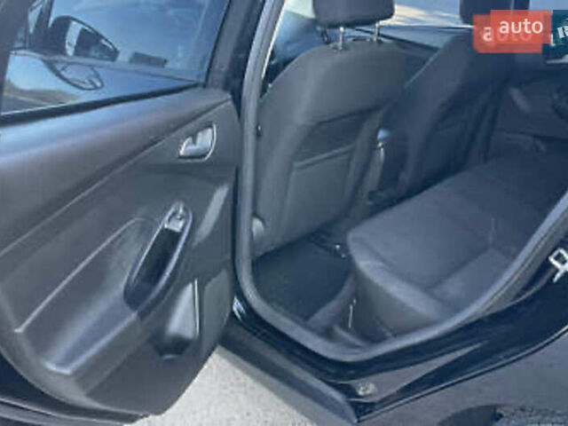 Чорний Форд Фокус, об'ємом двигуна 2 л та пробігом 220 тис. км за 6999 $, фото 5 на Automoto.ua