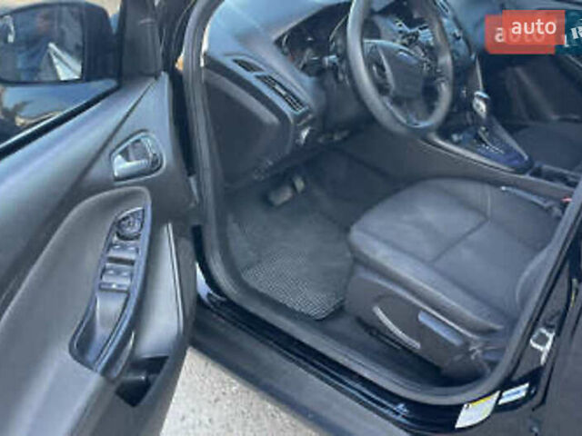 Чорний Форд Фокус, об'ємом двигуна 2 л та пробігом 220 тис. км за 6999 $, фото 4 на Automoto.ua