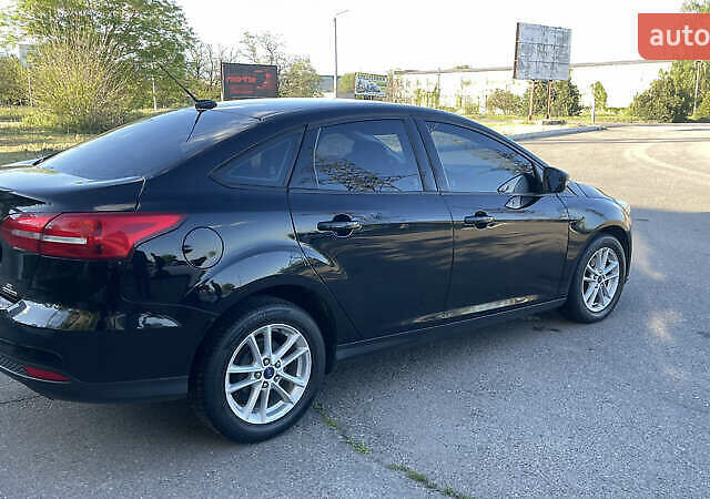 Чорний Форд Фокус, об'ємом двигуна 2 л та пробігом 220 тис. км за 6999 $, фото 2 на Automoto.ua
