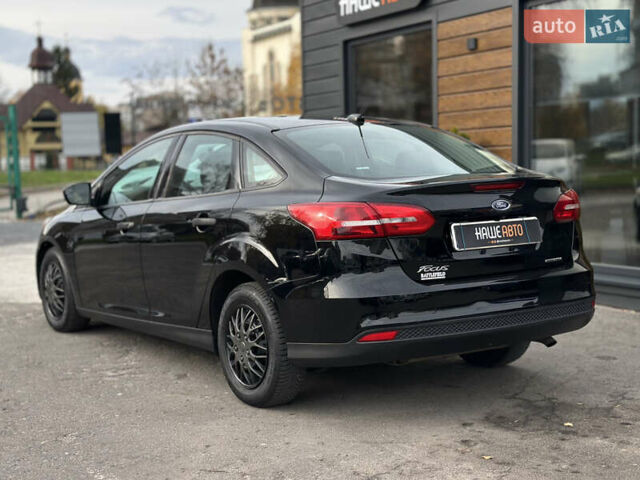 Чорний Форд Фокус, об'ємом двигуна 2 л та пробігом 121 тис. км за 9200 $, фото 11 на Automoto.ua
