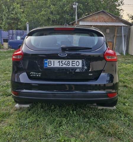 Чорний Форд Фокус, об'ємом двигуна 2 л та пробігом 113 тис. км за 9700 $, фото 4 на Automoto.ua
