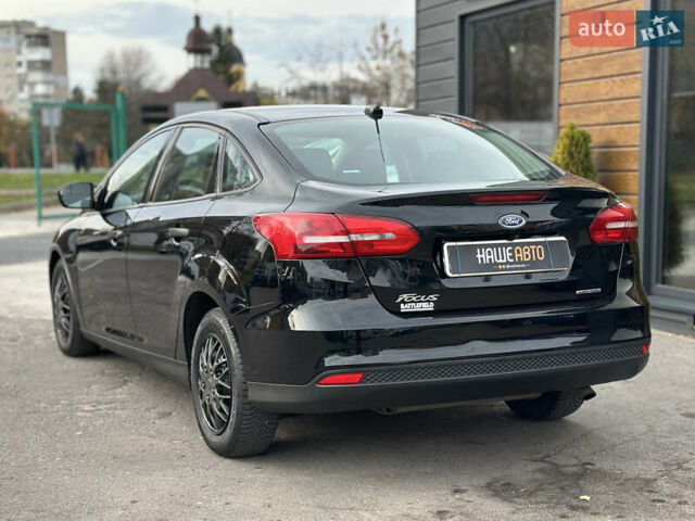 Чорний Форд Фокус, об'ємом двигуна 2 л та пробігом 121 тис. км за 9200 $, фото 12 на Automoto.ua