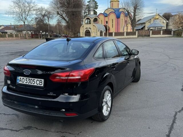 Чорний Форд Фокус, об'ємом двигуна 2 л та пробігом 165 тис. км за 7800 $, фото 2 на Automoto.ua