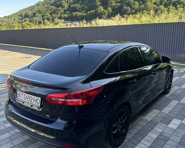 Черный Форд Фокус, объемом двигателя 2 л и пробегом 185 тыс. км за 10000 $, фото 5 на Automoto.ua