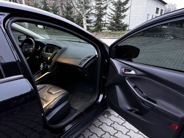 Черный Форд Фокус, объемом двигателя 2 л и пробегом 120 тыс. км за 7750 $, фото 21 на Automoto.ua