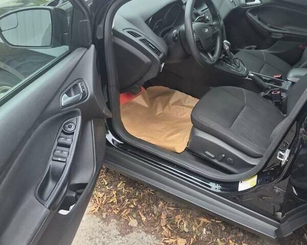 Черный Форд Фокус, объемом двигателя 2 л и пробегом 116 тыс. км за 7700 $, фото 15 на Automoto.ua