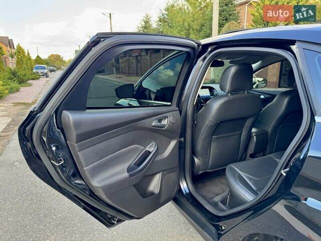 Черный Форд Фокус, объемом двигателя 2.01 л и пробегом 145 тыс. км за 9900 $, фото 40 на Automoto.ua